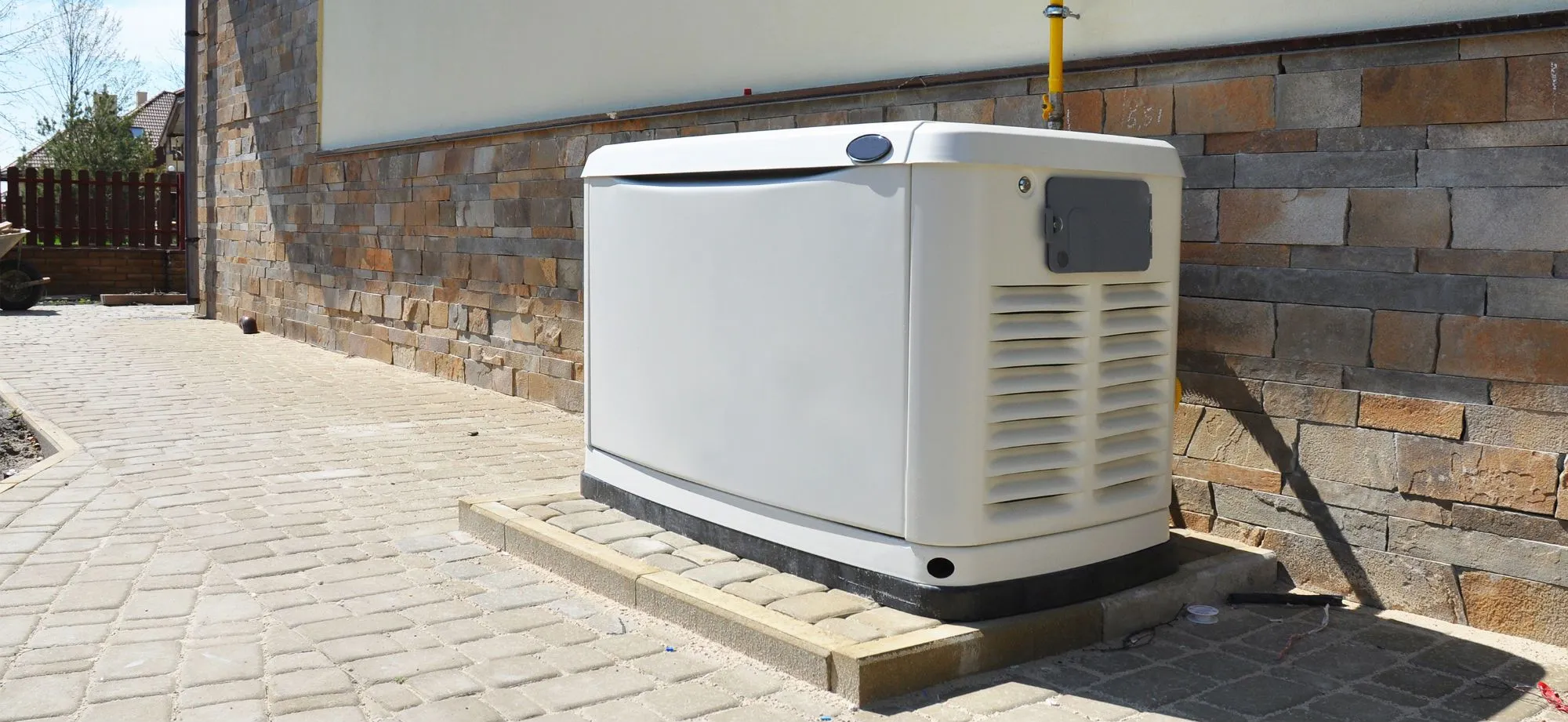 Whole-home standby generator installed beside a home in Hot Springs Village